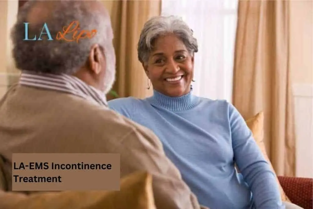Couple sat smiling at each other - LA-EMS treatment Paisley