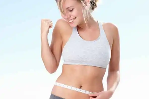 woman happy after fat reduction treatment Paisley